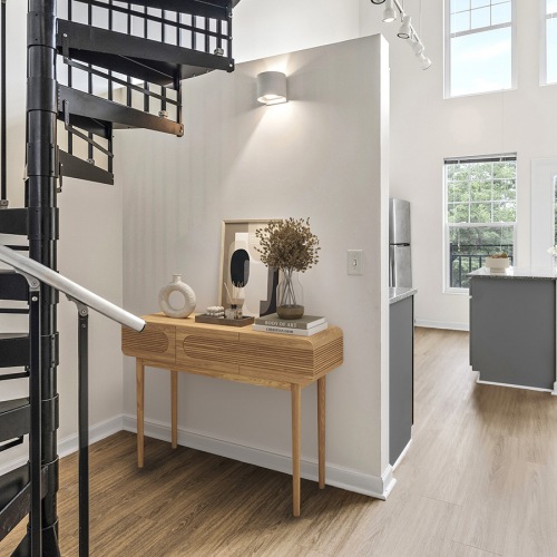 Thoughtful details to elevate your lifestyle a staircase in a large hallway